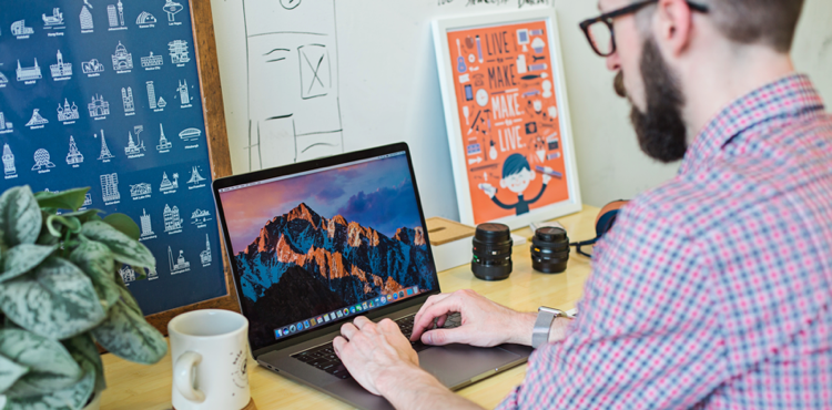 a man using a laptop